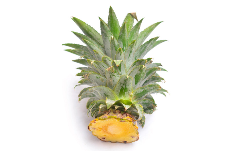 Remove the crown of your pineapple